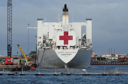 An emergency hospital in Central Park and a hospital ship in Manhattan Harbor